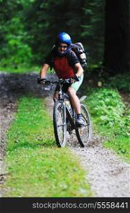 healthy lifestyle and fitness concept with mount bike man outdoor