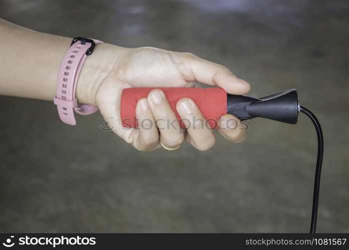 Healthy lifestyle concept female wearing sport tracker wristband arm, stock photo