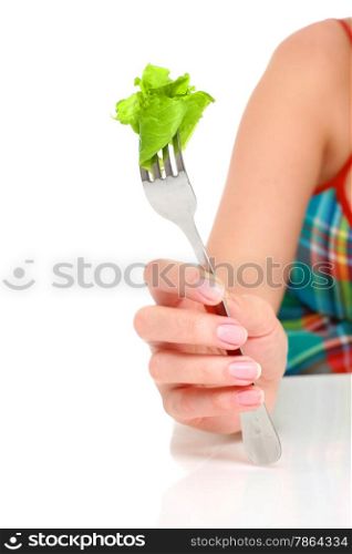 Healthy lifestyle concept. Hand with fork and salad isolated over white.