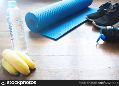 Healthy lifestyle objects on wooden floor
