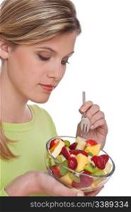 Healthy lifestyle series - Woman holding fruit salad on white background