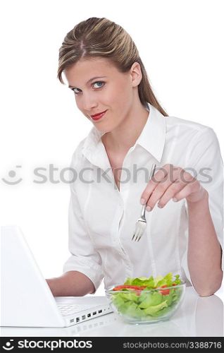 Healthy lifestyle series - Woman with laptop and salad on white background