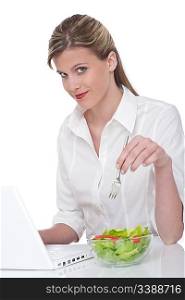 Healthy lifestyle series - Woman with laptop and salad on white background