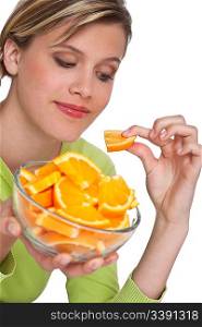 Healthy lifestyle series - Woman with orange on white background