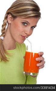 Healthy lifestyle series - Young woman with carrot juice on white background
