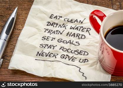 healthy lifestyle tips - handwriting on a napkin with a cup of coffee