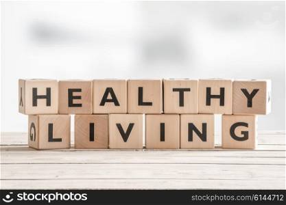 Healthy living sign with wooden cubes on a table