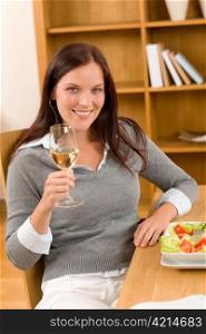 Healthy lunch at home attractive woman drink glass white wine