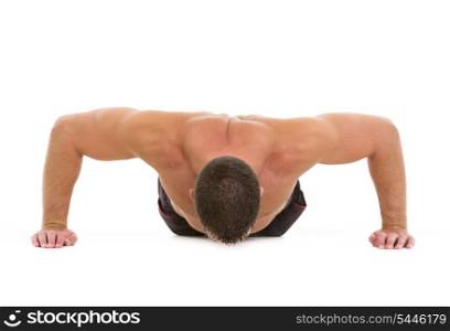 Healthy man making push up exercises