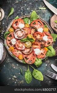 Healthy mediterranean tomatoes mozzarella salad , top view