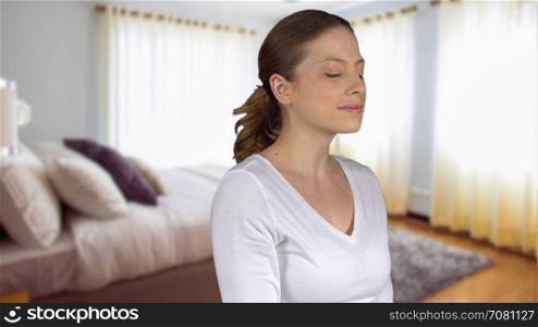 Healthy natural female stands in bedroom
