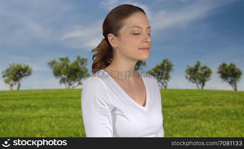 Healthy natural female stands in paradise
