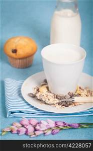 Healthy nutrition with fresh milk and a chocolate muffin
