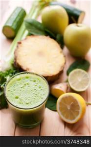 healthy organic green detox juice on wood