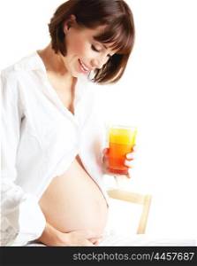 Healthy pregnant lady drinking orange juice, happy mother waiting for a new baby, pretty female isolated on white background, woman at home, diet and organic nutrition concept