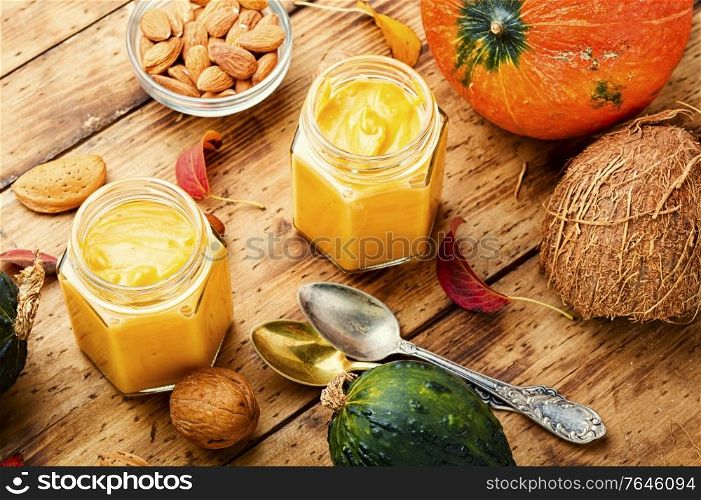 Healthy pumpkin smoothie in glass jars.Traditional autumn dishes. Fresh pumpkin smoothies