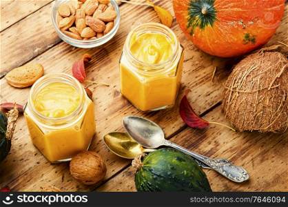 Healthy pumpkin smoothie in glass jars.Traditional autumn dishes. Fresh pumpkin smoothies