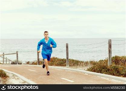 Healthy running man . Healthy running man on beach