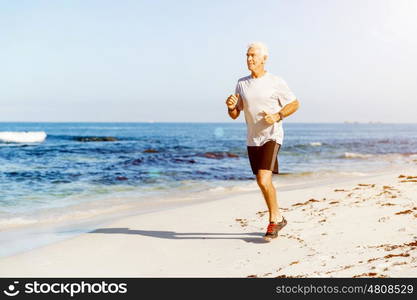 Healthy running man . Healthy running man on beach