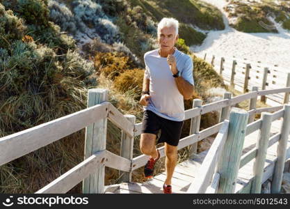 Healthy running man . Healthy running man on beach