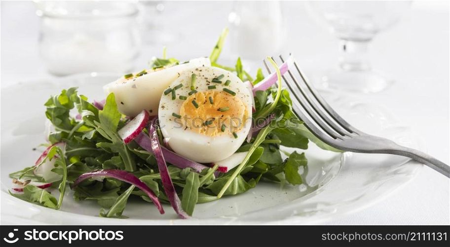 healthy salad with egg white plate