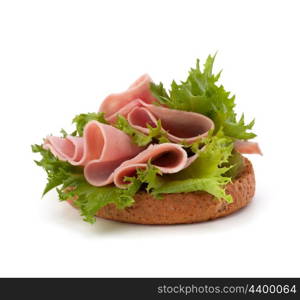 healthy sandwich with lettuce and smoked ham isolated on white background