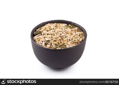Healthy seeds mix in a stone bowl on white background