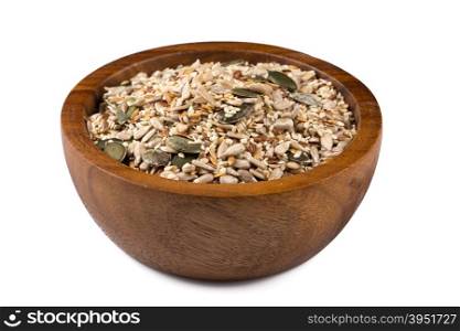 Healthy seeds mix in a wooden bowl on white background
