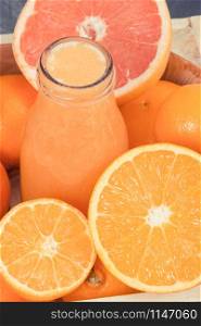 Healthy smoothie from citrus. Food containing natural minerals and vitamins. Dieting and slimming concept. Healthy smoothie from citrus. Food containing minerals and vitamins. Dieting and slimming concept