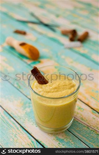 healthy smoothie with turmeric, vanilla, cinnamon and coconut milk