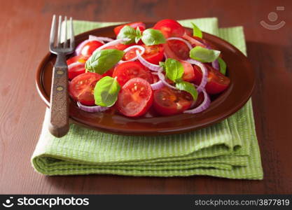 healthy tomato salad with onion basil olive oil and balsamic vinegar