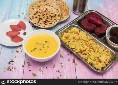 Healthy vegan food. Healthy vegan food: soup with pumpkin seeds, rice with vegetables, beet cutlets, tortillas, compote with pear and chocolate balls