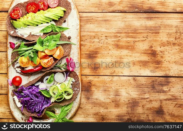Healthy vegan tacos.Healthy vegan salad tortilla wraps and vegetables. Mexican vegetarian taco