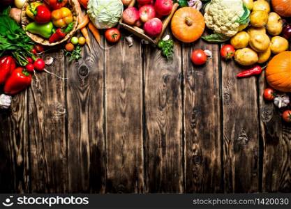 Healthy vegetables. Fresh vegetables with herbs. On wooden background.. Healthy vegetables.