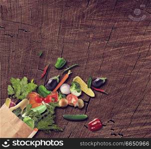 Healthy Vegetarian Food in a paper bag  On Wooden Background