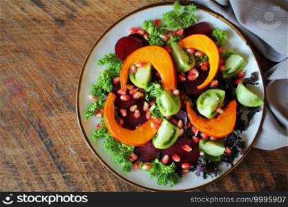 Healthy vegetarian salad, roasted pumpkin, tomato,pomegranate, kale, beet .. Healthy vegetarian salad, roasted pumpkin, tomato,pomegranate, kale, beet