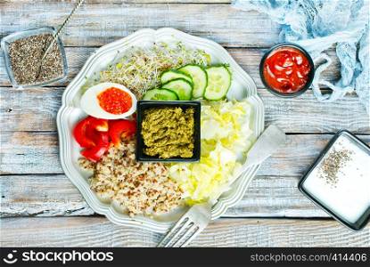 Healthy vegetarian salad with vegetables qinoa chickpea salad leaves. Healthy buddha bowl salad.