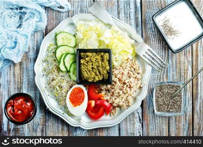 Healthy vegetarian salad with vegetables qinoa chickpea salad leaves. Healthy buddha bowl salad.