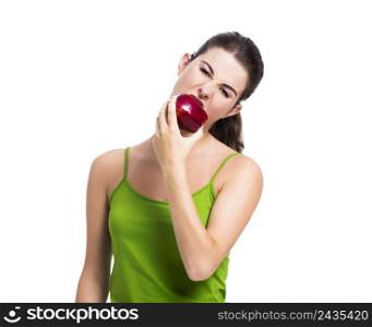 Healthy woman biting a fresh apple, isolated over a white background