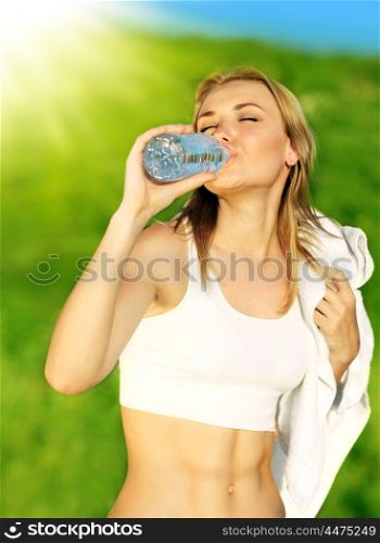 Healthy woman drinks water, doing sport outdoor, fitness, diet &amp; body care concept
