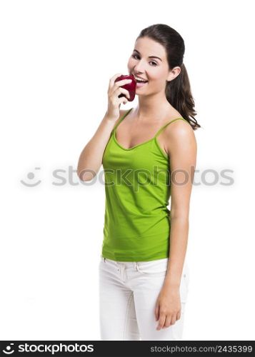 Healthy woman eating a fresh apple, isolated over a white background