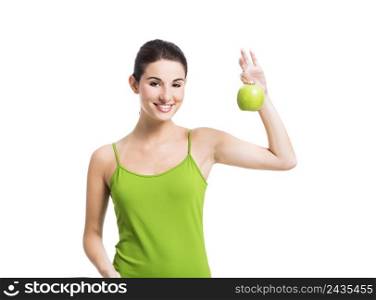 Healthy woman holding a fresh apple, isolated over a white background