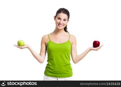 Healthy woman holding apples, isolated over a white background
