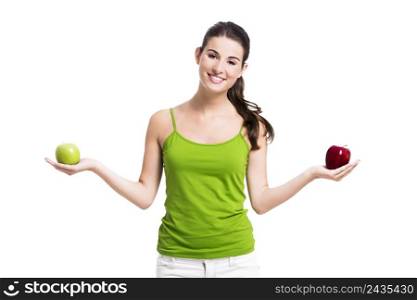 Healthy woman holding apples, isolated over a white background