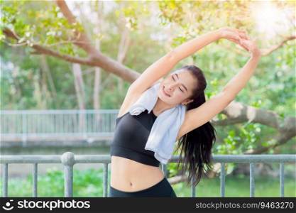 healthy woman morning exercise fitness with fresh green tree park outdoor background