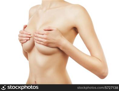 healthy woman with hands on breasts on white background