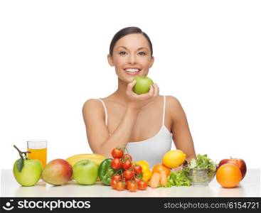 healthy woman with lot of fruits and vegetables in front. woman with fruits and vegetables