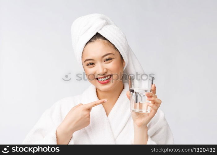 Healthy young beautiful woman drinking water, beauty face natural makeup, isolated over white background. Healthy young beautiful woman drinking water, beauty face natural makeup, isolated over white background.