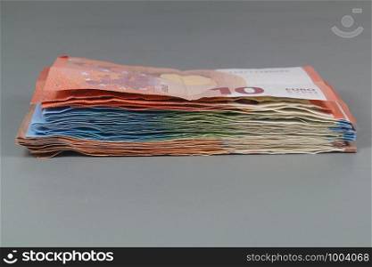 Heap of banknotes of ten, twenty and fifty euros