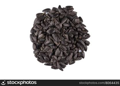 Heap of black sunflower seeds isolated on a white background